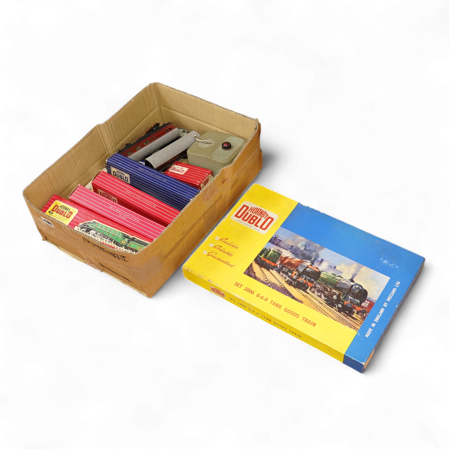 A collection of Hornby Dublo for 2 rail running, including; a boxed BR class A4 4-6-2, Golden Fleece 60030, (2211), together with three boxed bogie coaches and two wagons, plus four unboxed wagons, and a complete box set